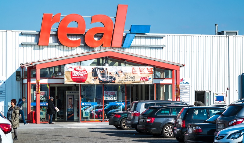 Online Supermarkt: In einigen Filialen der Supermarkt-Kette Real werden Werbebildschirme an der Kasse getestet. (#03)